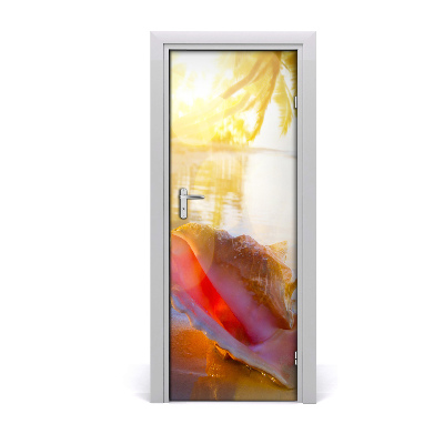 Ajtóposzter Egy nagy kagyló a tengerparton