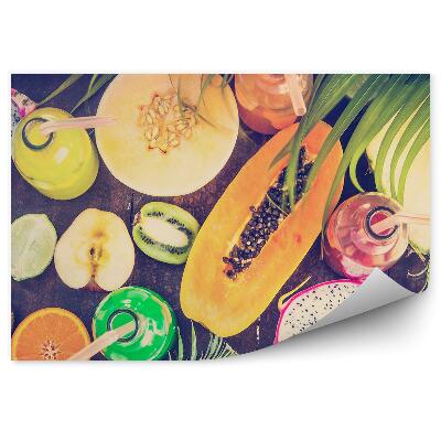 Öntapadós Fotótapéta Falra Trópusi gyümölcsök pálmalevél fából készült asztali gyümölcsitalok