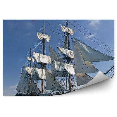 Fotótapéta Vitorlás hajó óceán város a háttérben