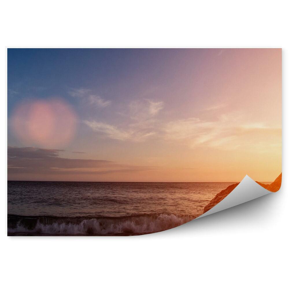 Öntapadós fotótapéta Sziklák óceán hullámai naplemente égbolt felhők