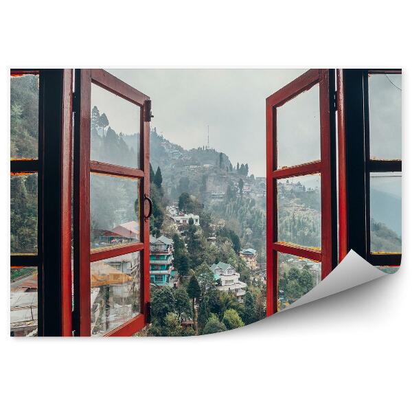 Öntapadós fotótapéta Régi város ablaka a hegyekben