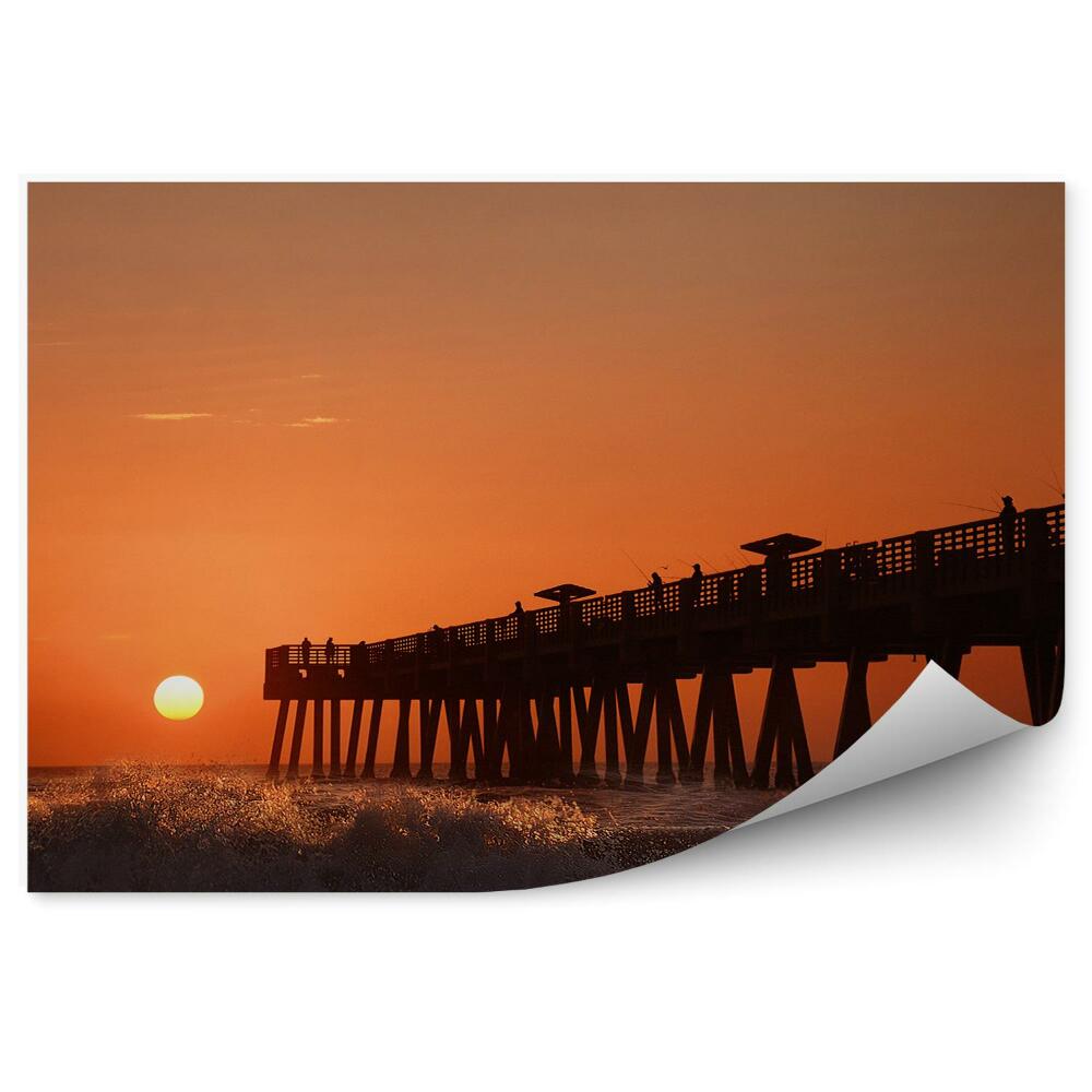 Öntapadó fotótapéta Pier emberek óceán tenger naplemente hullámok