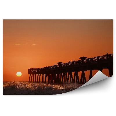 Öntapadó fotótapéta Pier emberek óceán tenger naplemente hullámok