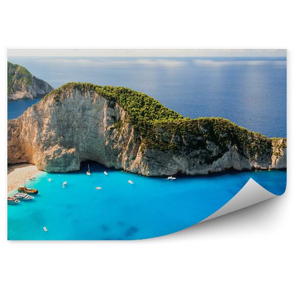 Fotótapéta Sziklák jachtok növények tengerpart ég felhők óceán