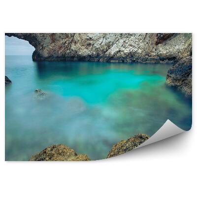 Öntapadós fotótapéta Tengeri lagúna kő boltívvel Görögország