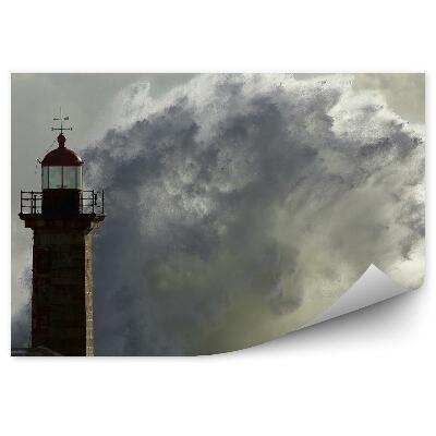 Poszter tapéta Viharos hullámok összecsapnak egy világítótoronynál