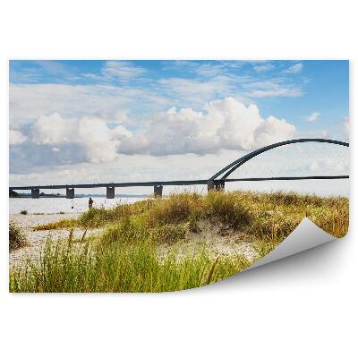 Öntapadó fotótapéta Bridge yacht fű homokos tó égbolt felhők