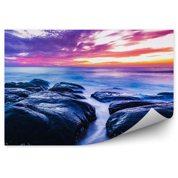 Öntapadós fotótapéta falra Kövek víz tenger színes égbolt felhők