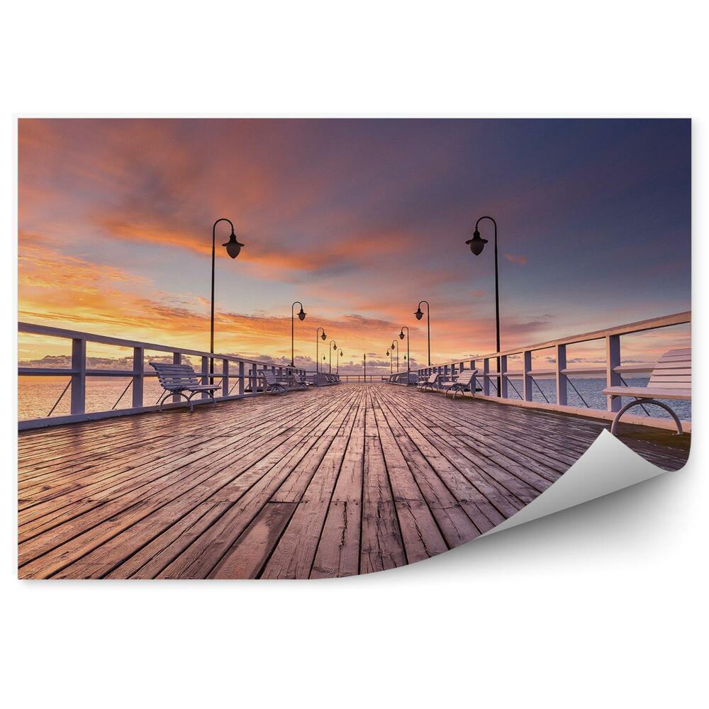 Fotótapéta Felhős égbolt naplemente móló