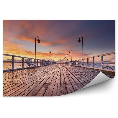 Fotótapéta Felhős égbolt naplemente móló