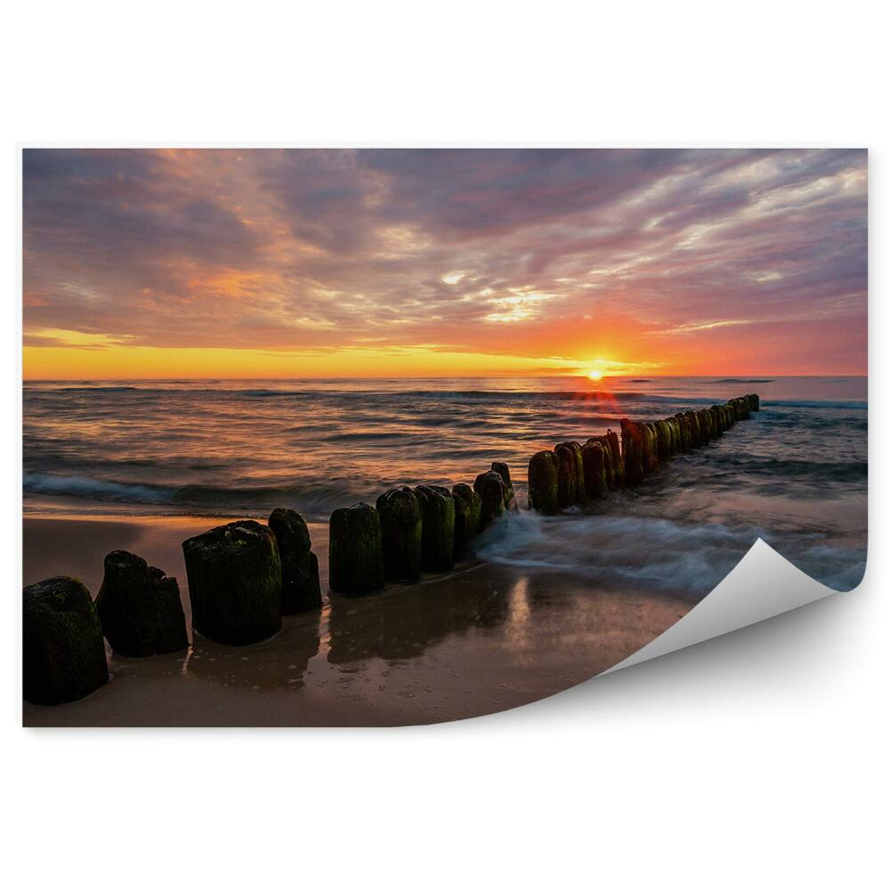 Fotótapéta Tengerpart hullámtörő homokos part