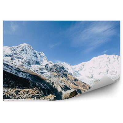 Öntapadó fotótapéta Hó a Himalája-hegység lábánál és a kék ég