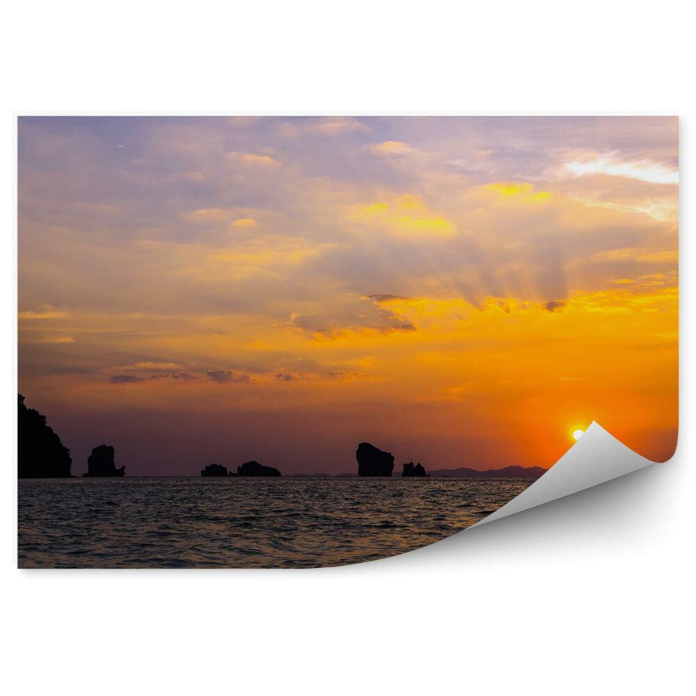 Öntapadós fotótapéta falra Naplemente sziklák óceán felhők