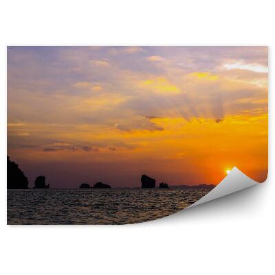 Öntapadós fotótapéta falra Naplemente sziklák óceán felhők