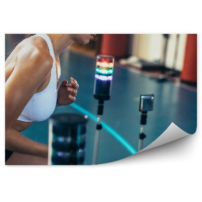 Fotótapéta Nő gyakorlása az edzőterem területén