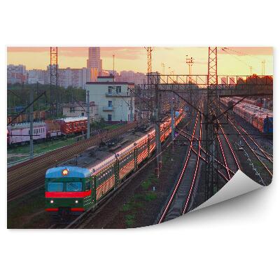 Fotótapéta Az induló vonatok fényei színezik a közlekedést