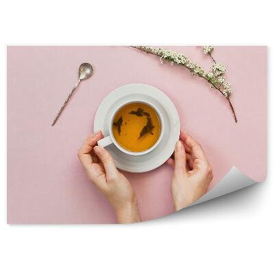 Öntapadós Fotótapéta Falra Női kezek fehér csésze rózsaszín háttér gally virágok