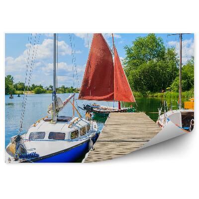 Fotótapéta Fából készült móló színes zöld csónakokkal