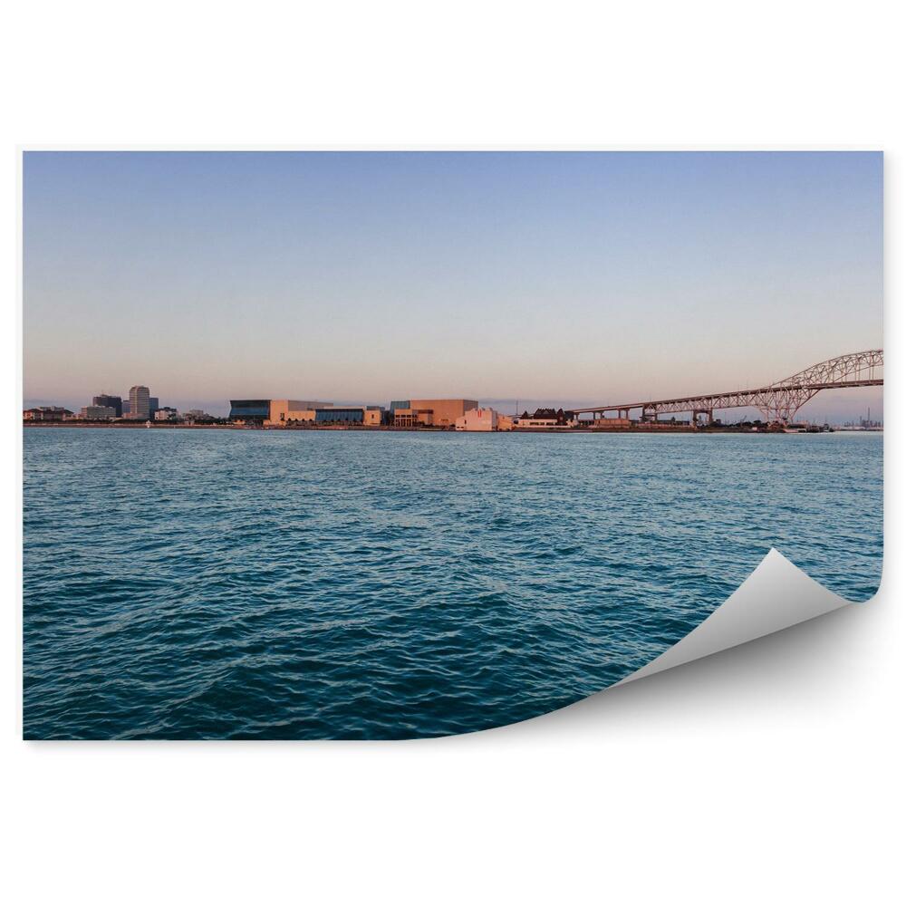 Fotótapéta Óceán égbolt épületek hidak napkelte