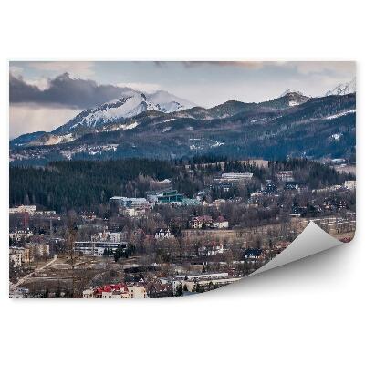 Öntapadó fotótapéta Gubałówka épületek tűlevelű fák ég felhők hó hegyek