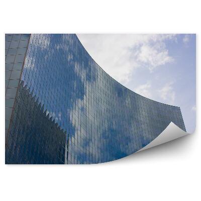 Fotótapéta Üvegezett felhőkarcoló tükrözi a várost