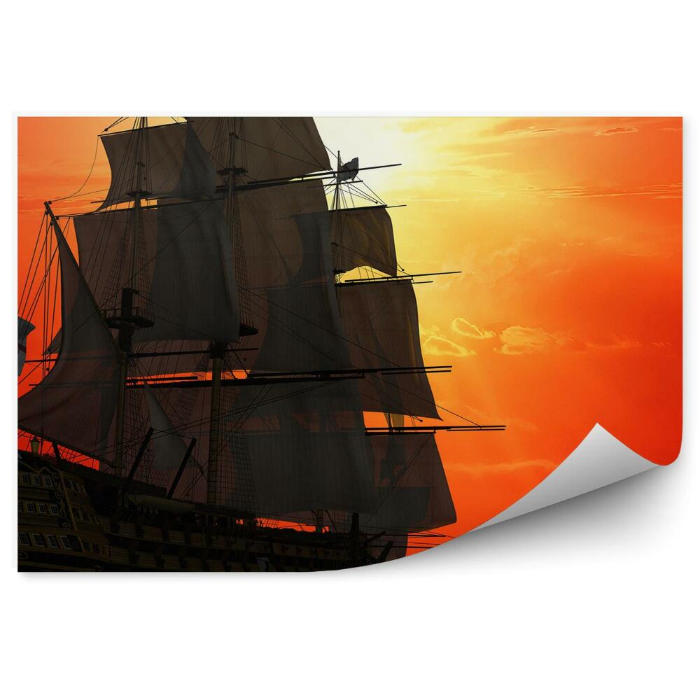 Fotótapéta Egy régi fából készült hajó hajózik a lenyugvó napba