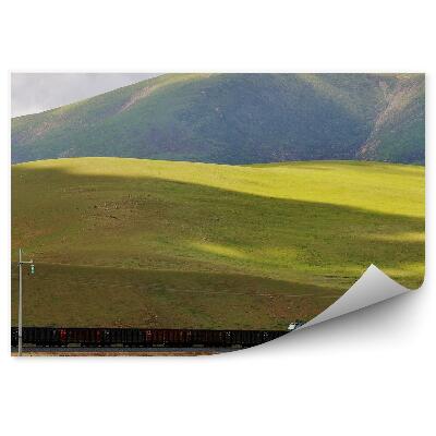 Öntapadó fotótapéta Tibeti vasúti hegyek zöld felhők