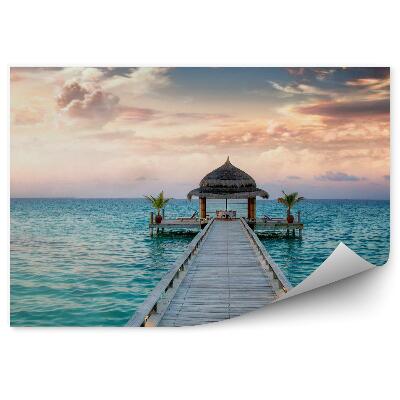 Öntapadó fotótapéta Ocean Maldív-szigetek híd égbolt felhők pálmafák pavilon naplemente