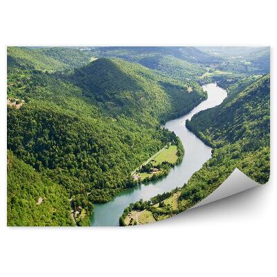 Fotótapéta Folyó zöld hegyek fák út házak ég