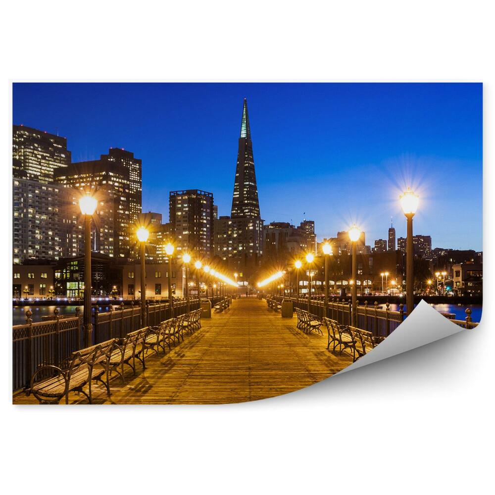 Öntapadós fotótapéta falra Felhőkarcolók komp híd padok lámpák óceán ég