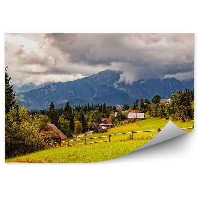 Öntapadó fotótapéta Hegyi kunyhók Tátra magas hegyek kerítés felhők