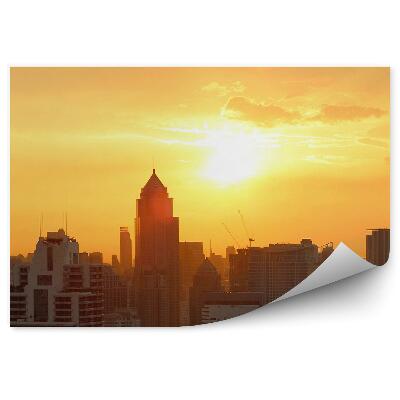 Fotótapéta Naplemente a város felhőkarcolók panorámája felett