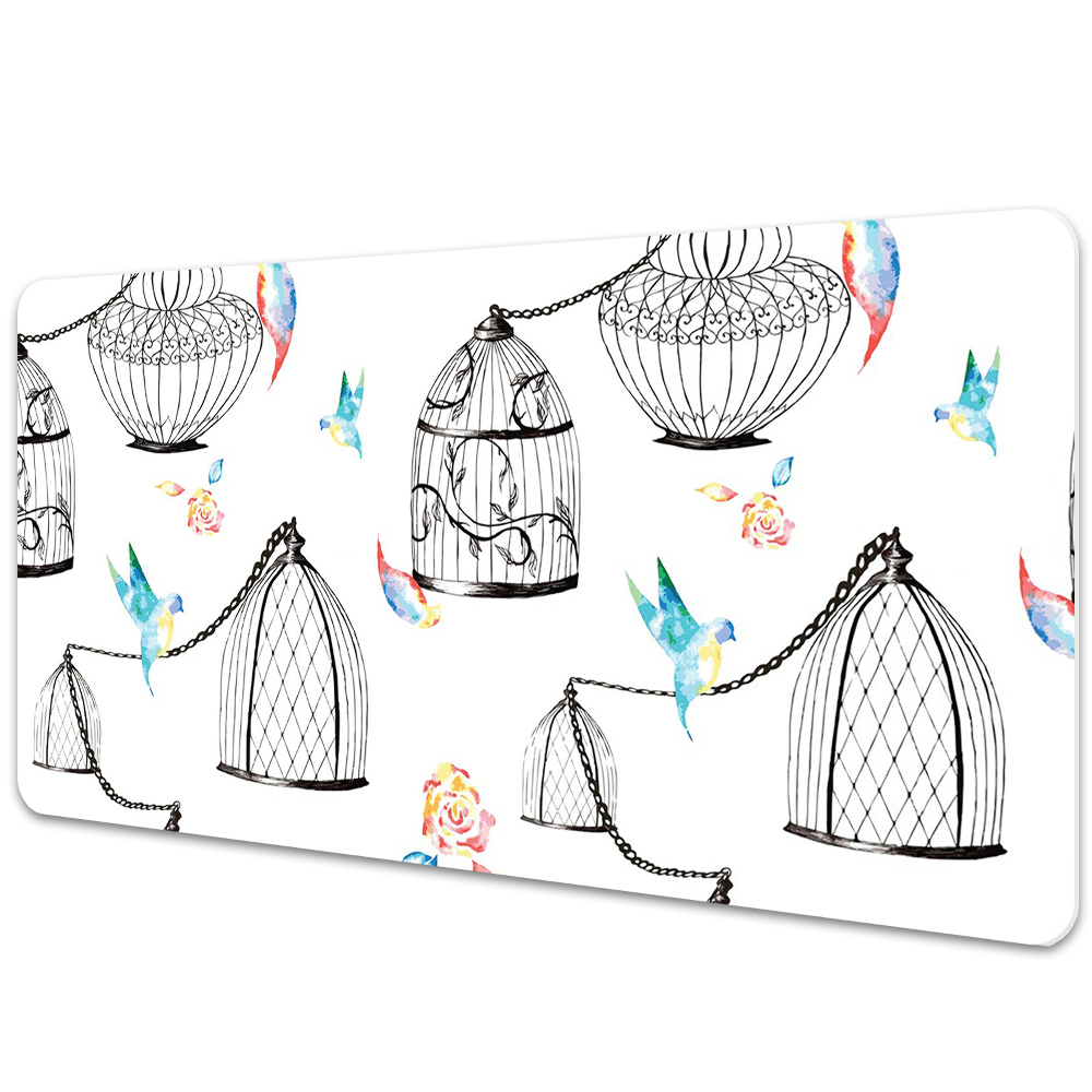 Iróasztal alátét Madarak egy ketrecben