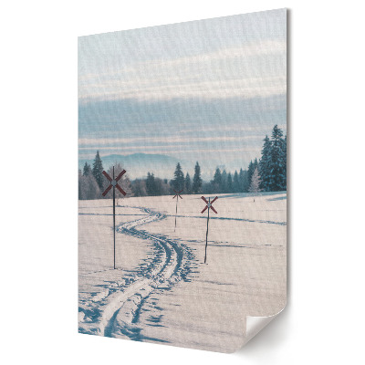 Téli táj nyomokkal a hóban plakát